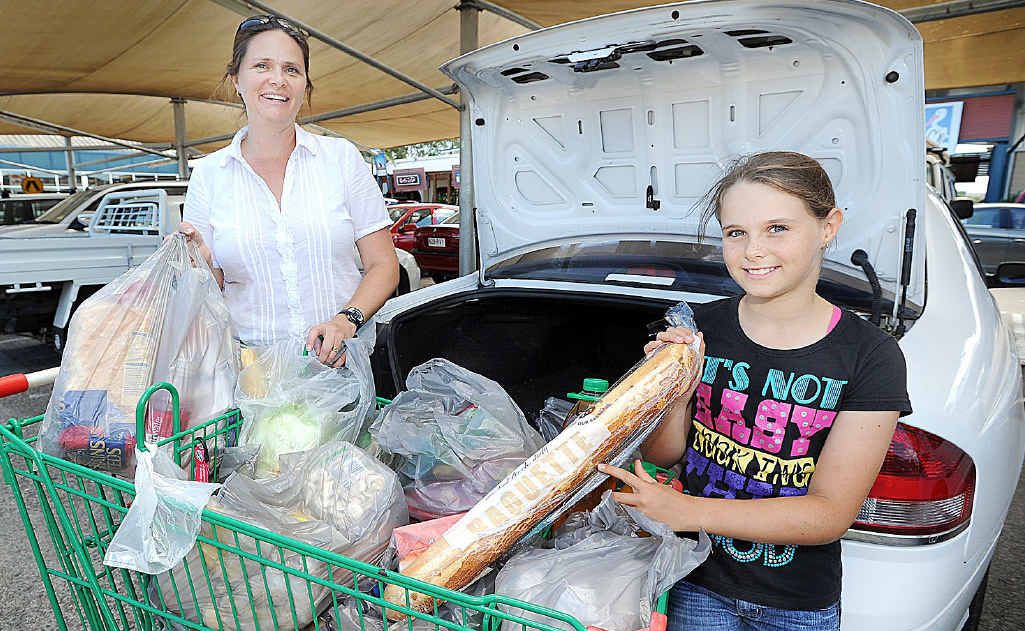 Julie Thomson and daughter Jessica, 9, do their weekly shopping at Woolworths. Julie Thomson and daughter Jessica, 9, do their weekly shopping at Woolworths.